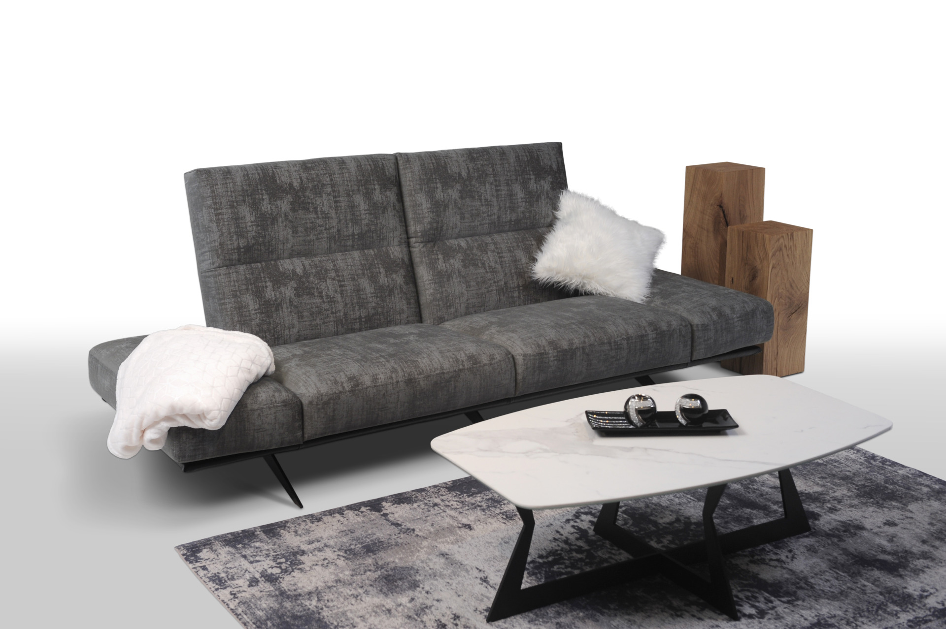 CLEO &ndash; Nowoczesna sofa na czarnych płozach